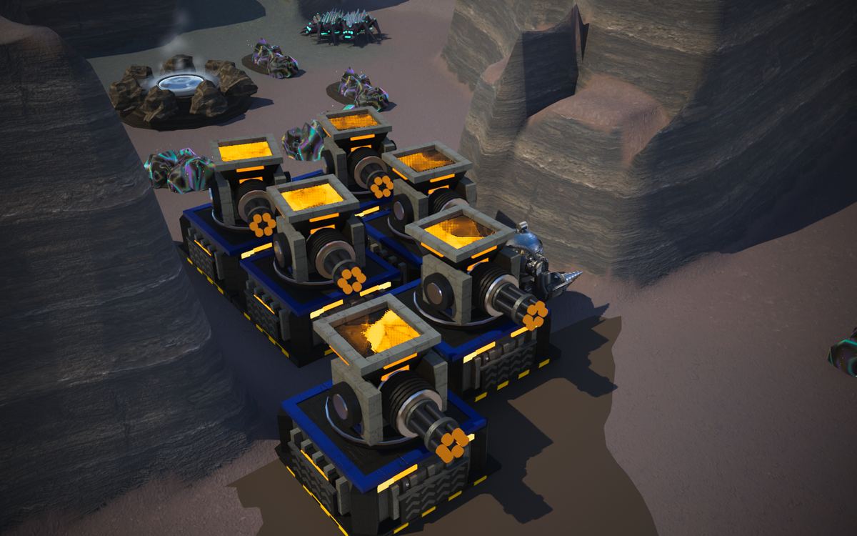 Six Gatling Guns packed edge to edge beside The Fork's prize, their amber hoppers glowing