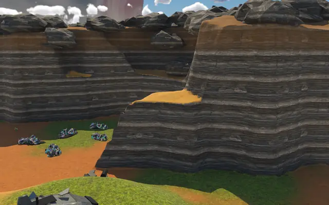 Banded canyon walls stepping down into a bay, a shelf halfway up